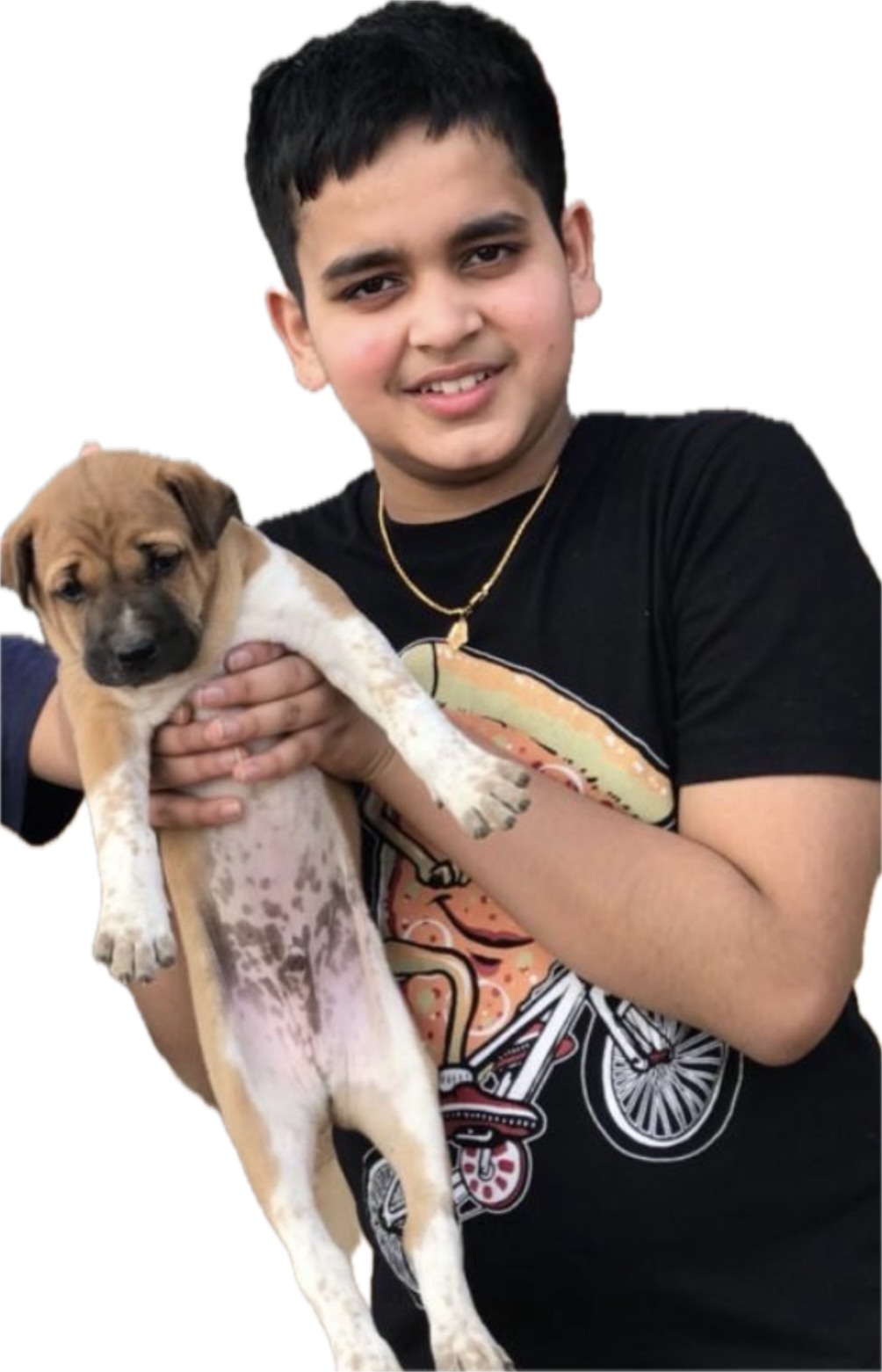 Boy holding puppy